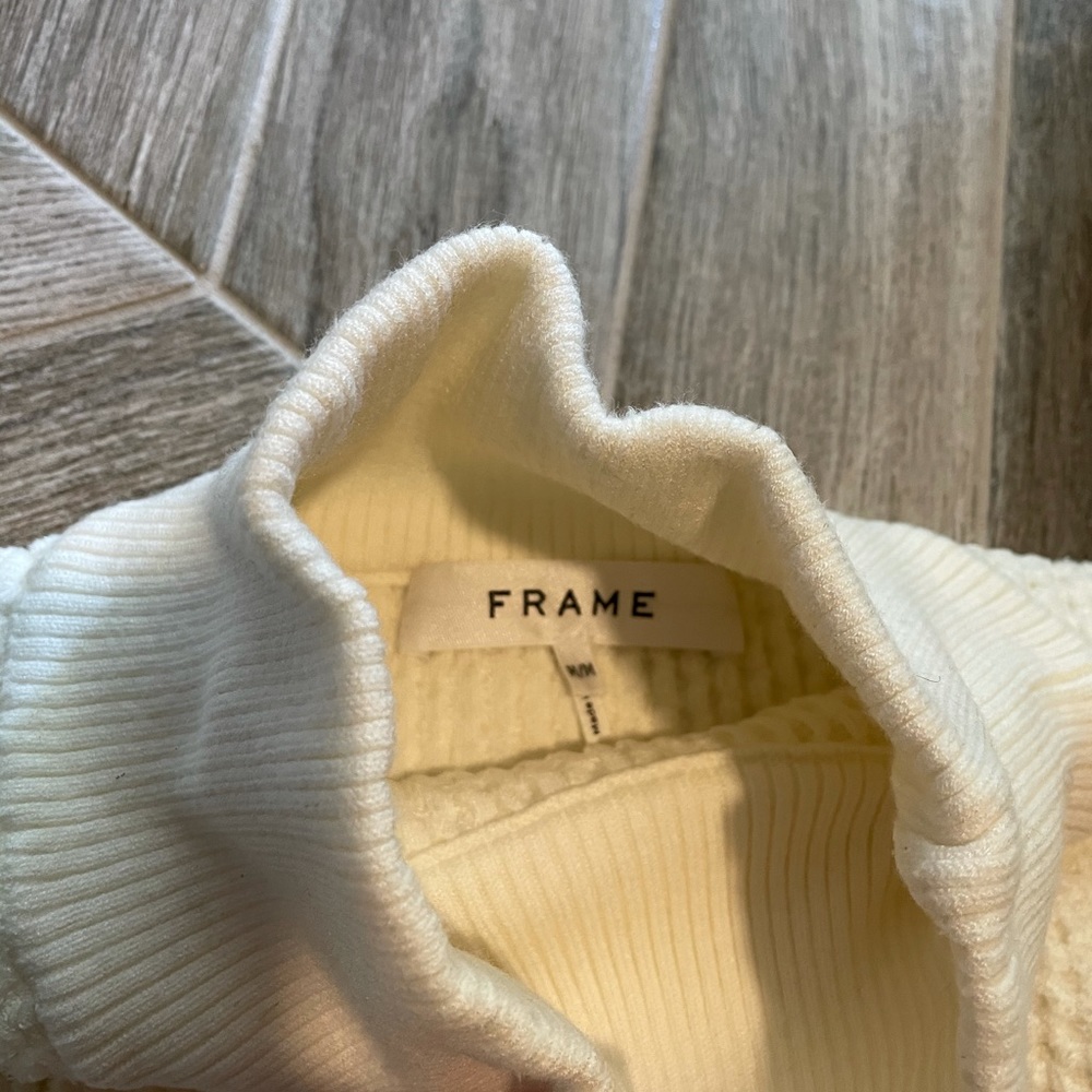 Frame sweater